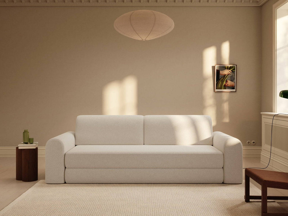 Offwhite bouclé sovesofa 200x200 cm med runde arme, lav ryg og bløde hynder i roligt, lyst rum