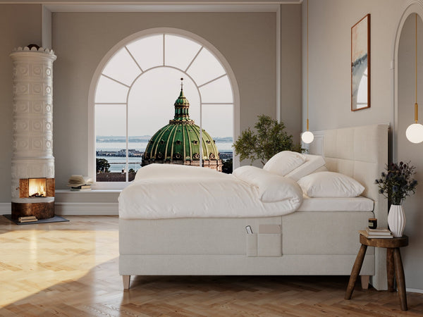 Aura Nordlys 210x210 Bouclé cream Nordic Dream tilbyder senge med skandinavisk design og højkvalitets materialer. Oplev perfekt komfort for en god nattesøvn. Bestil din i dag!