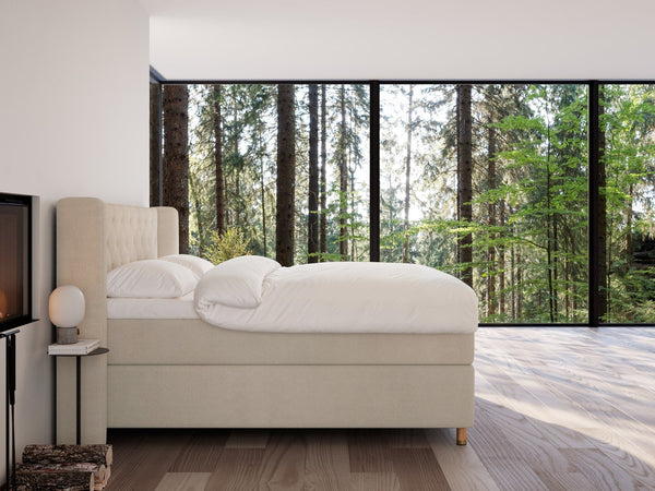 Eira Fjord 200x200 Bouclé cream Nordic Dream tilbyder senge med skandinavisk design og højkvalitets materialer. Oplev perfekt komfort for en god nattesøvn. Bestil din i dag!