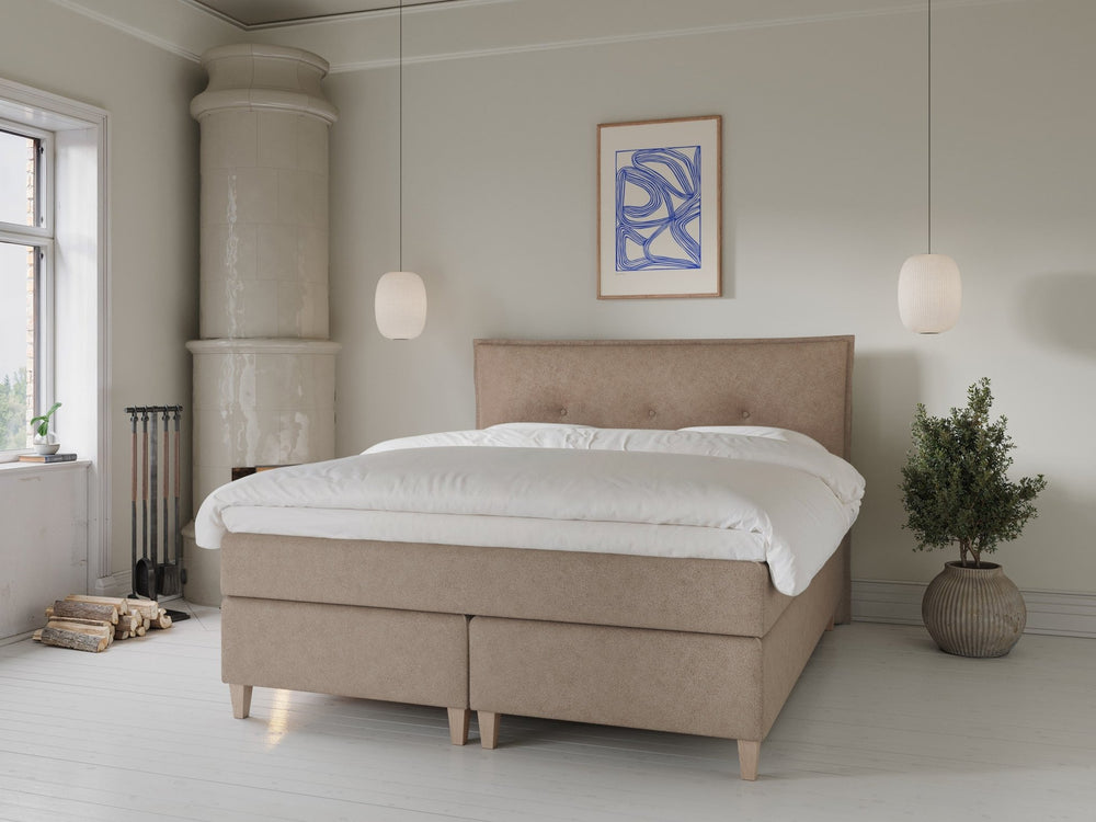 Snefrid Fjäll 180x200 Bouclé latte Nordic Dream tilbyder senge med skandinavisk design og højkvalitets materialer. Oplev perfekt komfort for en god nattesøvn. Bestil din i dag!