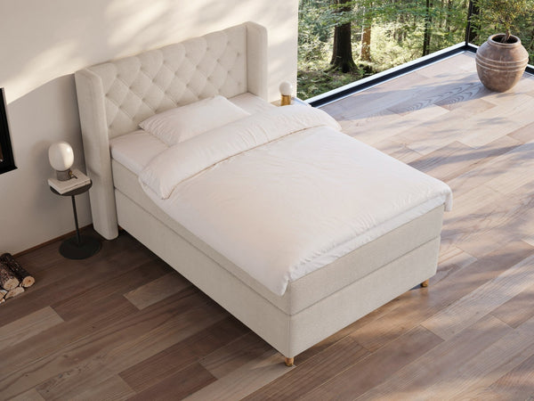 Eira Fjord 140x200 Bouclé cream Nordic Dream tilbyder senge med skandinavisk design og højkvalitets materialer. Oplev perfekt komfort for en god nattesøvn. Bestil din i dag!