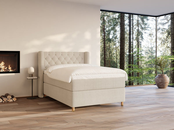 Eira Fjord 140x200 Bouclé cream Nordic Dream tilbyder senge med skandinavisk design og højkvalitets materialer. Oplev perfekt komfort for en god nattesøvn. Bestil din i dag!
