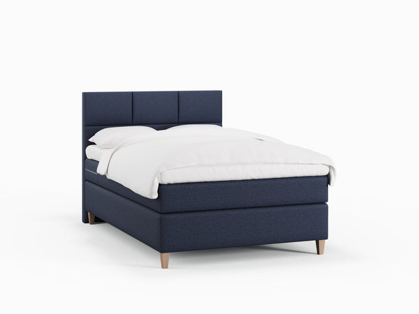 Snefrid Älv 120x200 Dyb blå Nordic Dream tilbyder senge med skandinavisk design og højkvalitets materialer. Oplev perfekt komfort for en god nattesøvn. Bestil din i dag!