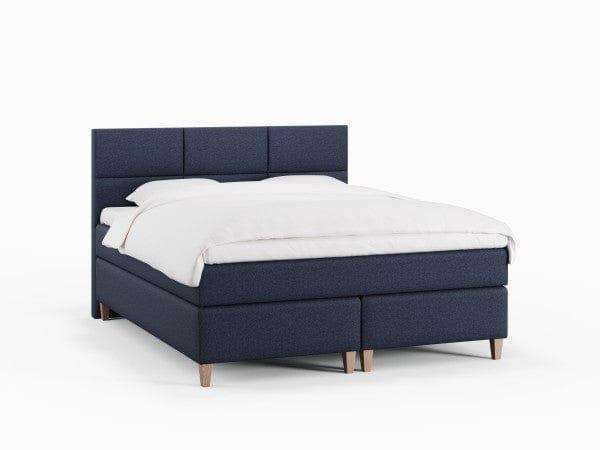 Snefrid Fjord 160x200 Dyb blå Nordic Dream tilbyder senge med skandinavisk design og højkvalitets materialer. Oplev perfekt komfort for en god nattesøvn. Bestil din i dag!