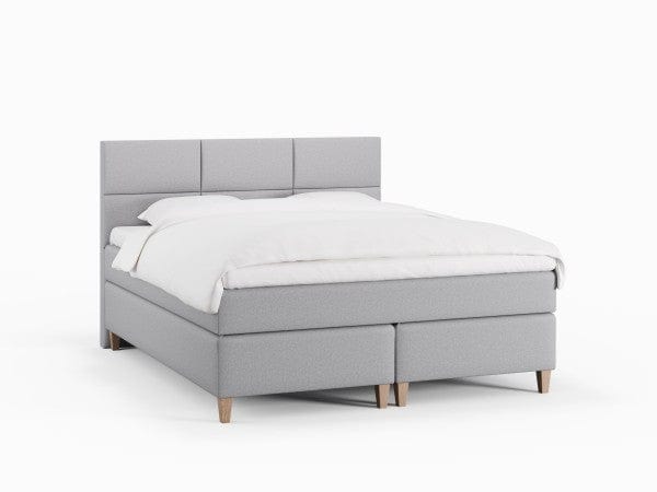 Snefrid Fjord 150x200 Lys grå Nordic Dream tilbyder senge med skandinavisk design og højkvalitets materialer. Oplev perfekt komfort for en god nattesøvn. Bestil din i dag!