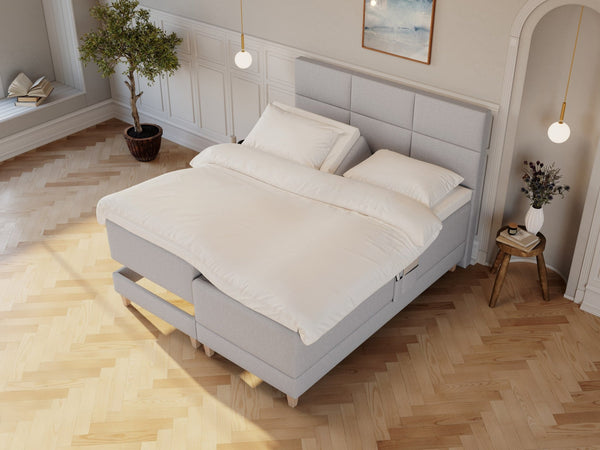 Aura Nordlys 160x200 Lys grå Nordic Dream tilbyder senge med skandinavisk design og højkvalitets materialer. Oplev perfekt komfort for en god nattesøvn. Bestil din i dag!