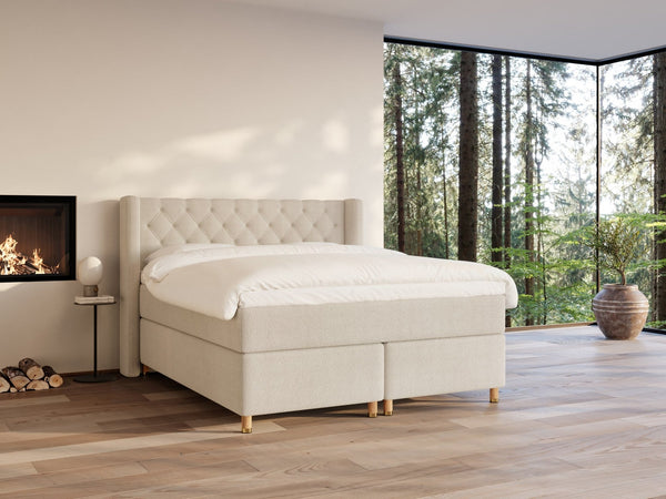 Eira Fjord 180x200 Bouclé cream Nordic Dream tilbyder senge med skandinavisk design og højkvalitets materialer. Oplev perfekt komfort for en god nattesøvn. Bestil din i dag!