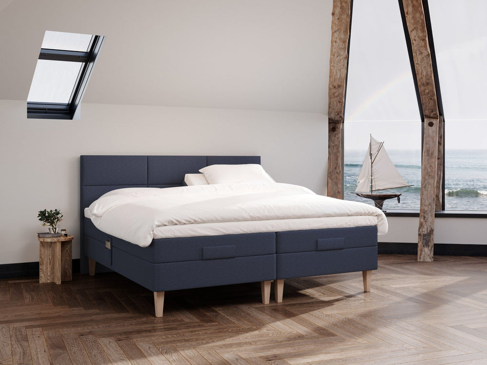 Ragna Fjord 210x210 Dyb blå Nordic Dream tilbyder senge med skandinavisk design og højkvalitets materialer. Oplev perfekt komfort for en god nattesøvn. Bestil din i dag!