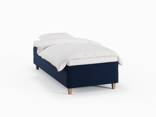 Freja Nordlys 90x210 Dyb blå Nordic Dream tilbyder senge med skandinavisk design og højkvalitets materialer. Oplev perfekt komfort for en god nattesøvn. Bestil din i dag!