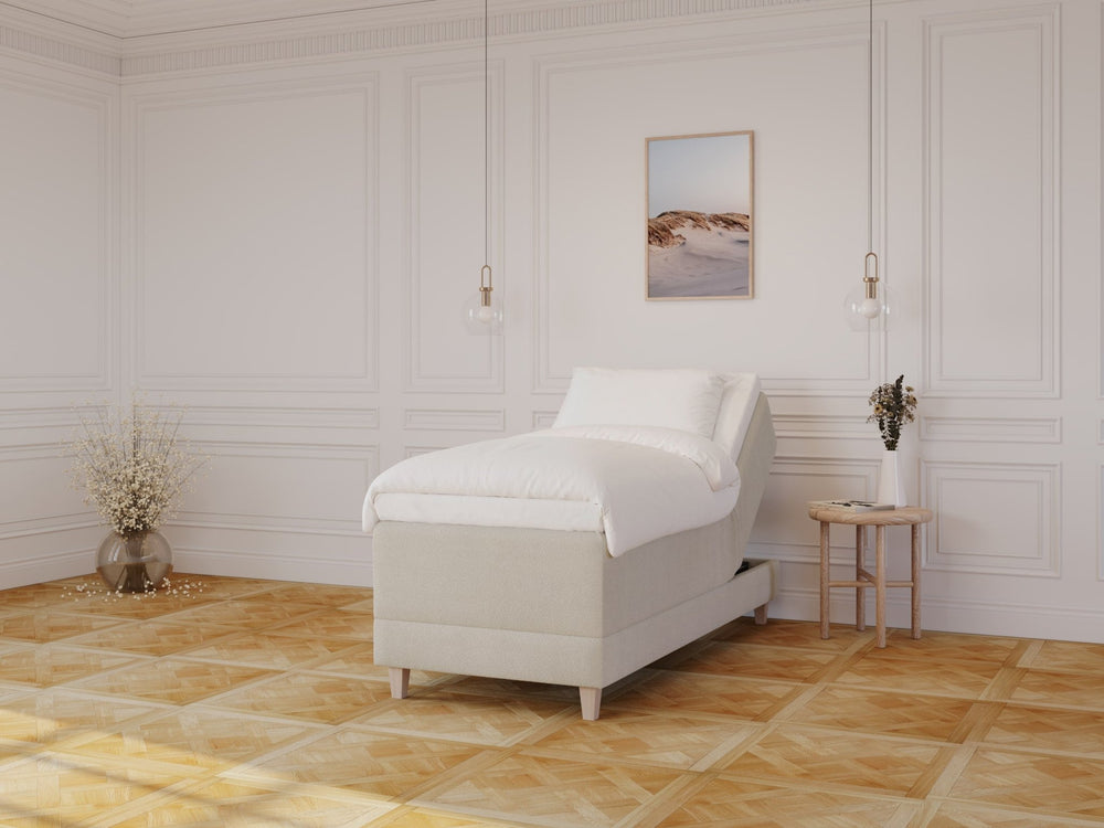 Aura Fjord 90x210 Bouclé cream Nordic Dream tilbyder senge med skandinavisk design og højkvalitets materialer. Oplev perfekt komfort for en god nattesøvn. Bestil din i dag!