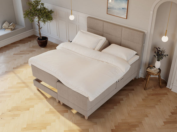 Aura Älv 180x210 Bouclé latte Nordic Dream tilbyder senge med skandinavisk design og højkvalitets materialer. Oplev perfekt komfort for en god nattesøvn. Bestil din i dag!