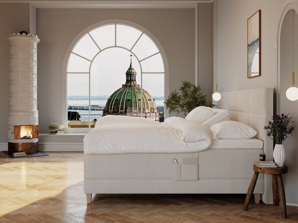 Aura Älv 210x210 Bouclé cream Nordic Dream tilbyder senge med skandinavisk design og højkvalitets materialer. Oplev perfekt komfort for en god nattesøvn. Bestil din i dag!