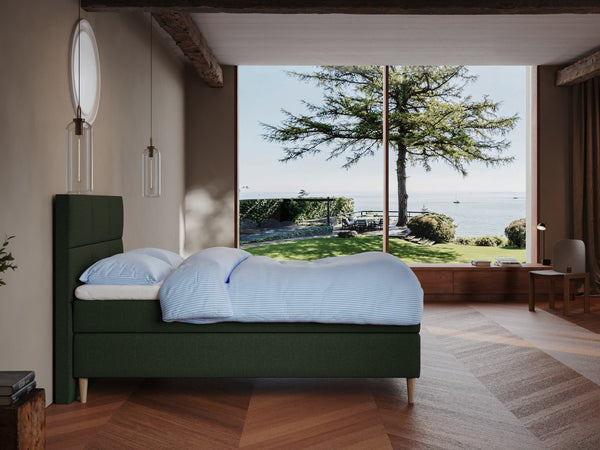 Svanhild Fjäll 140x200 Dyb grøn Nordic Dream tilbyder senge med skandinavisk design og højkvalitets materialer. Oplev perfekt komfort for en god nattesøvn. Bestil din i dag!