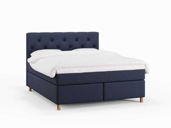 Nora Nordlys 180x200 Dyb blå Nordic Dream tilbyder senge med skandinavisk design og højkvalitets materialer. Oplev perfekt komfort for en god nattesøvn. Bestil din i dag!