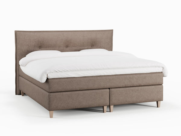 Snefrid Fjäll 210x210 Bouclé latte Nordic Dream tilbyder senge med skandinavisk design og højkvalitets materialer. Oplev perfekt komfort for en god nattesøvn. Bestil din i dag!