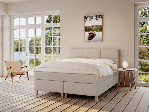 Snefrid Fjäll 210x210 Sand Nordic Dream tilbyder senge med skandinavisk design og højkvalitets materialer. Oplev perfekt komfort for en god nattesøvn. Bestil din i dag!