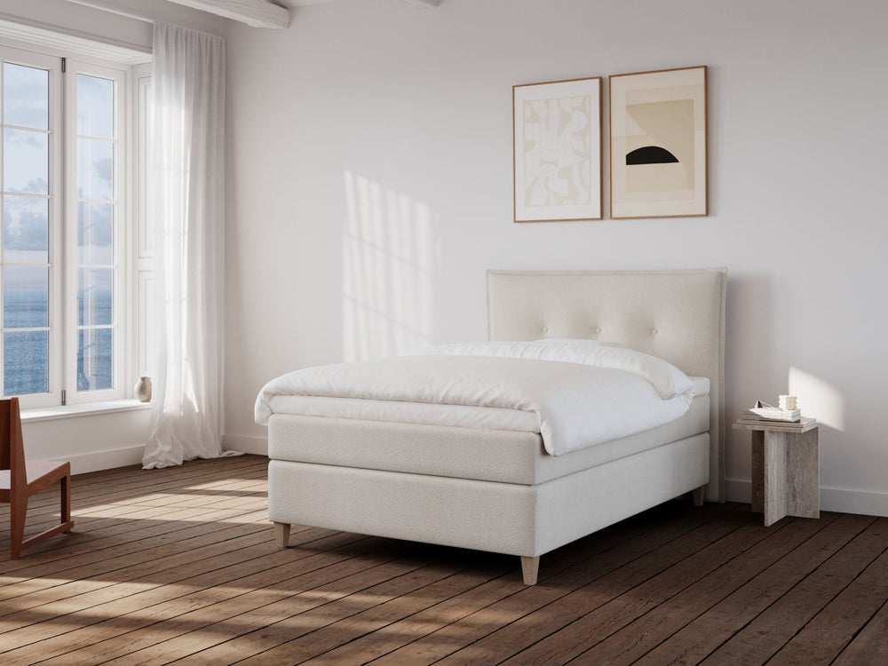 Snefrid Nordlys 140x200 Bouclé cream Nordic Dream tilbyder senge med skandinavisk design og højkvalitets materialer. Oplev perfekt komfort for en god nattesøvn. Bestil din i dag!