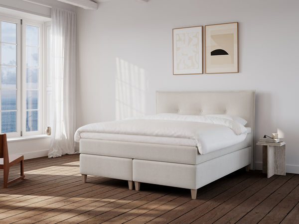 Snefrid Nordlys 160x210 Bouclé cream Nordic Dream tilbyder senge med skandinavisk design og højkvalitets materialer. Oplev perfekt komfort for en god nattesøvn. Bestil din i dag!