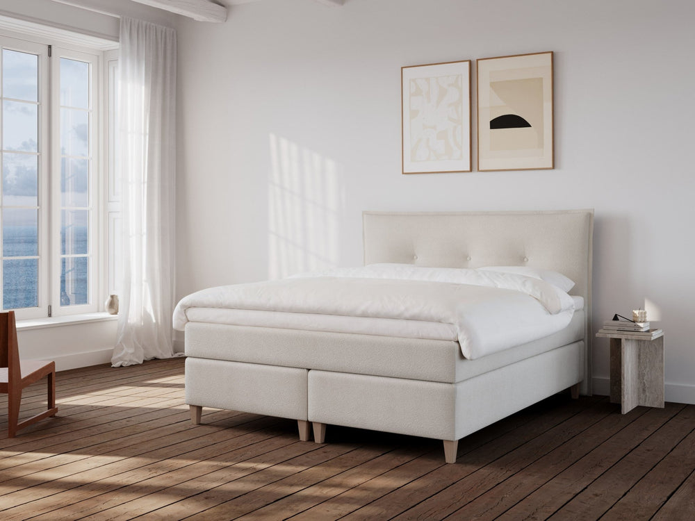 Snefrid Nordlys 160x200 Bouclé cream Nordic Dream tilbyder senge med skandinavisk design og højkvalitets materialer. Oplev perfekt komfort for en god nattesøvn. Bestil din i dag!