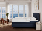 Snefrid Nordlys 220x220 Dyb blå Nordic Dream tilbyder senge med skandinavisk design og højkvalitets materialer. Oplev perfekt komfort for en god nattesøvn. Bestil din i dag!