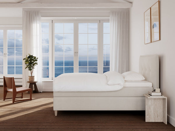 Snefrid Nordlys 120x200 Bouclé cream Nordic Dream tilbyder senge med skandinavisk design og højkvalitets materialer. Oplev perfekt komfort for en god nattesøvn. Bestil din i dag!