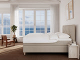 Snefrid Nordlys 220x220 Bouclé latte Nordic Dream tilbyder senge med skandinavisk design og højkvalitets materialer. Oplev perfekt komfort for en god nattesøvn. Bestil din i dag!